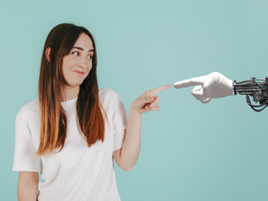 girl touching robot hand