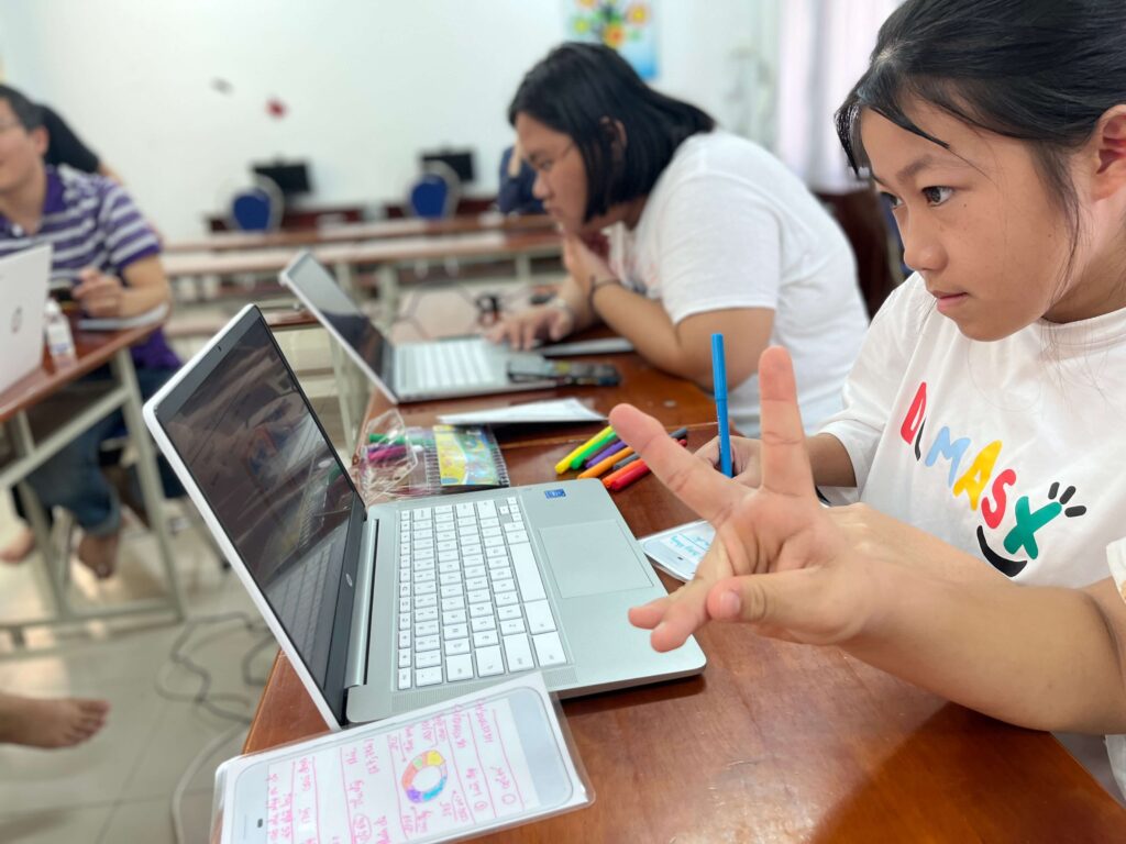 girl looking intently at laptop