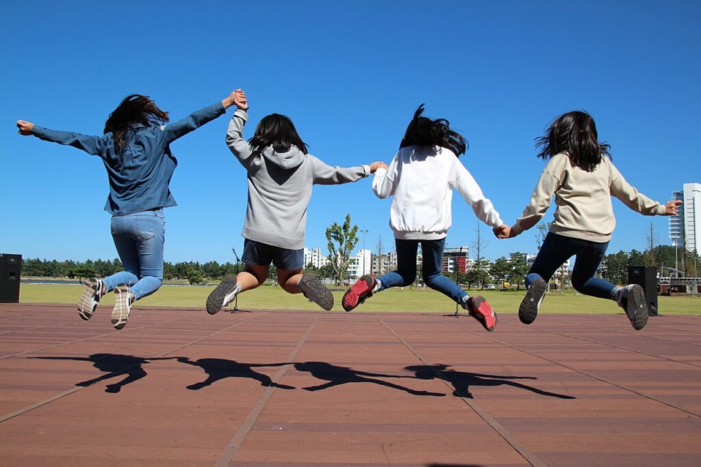 group of girls jumping