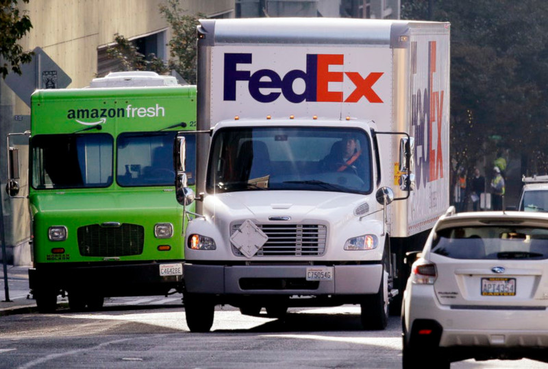 Fed-ex truck in traffic