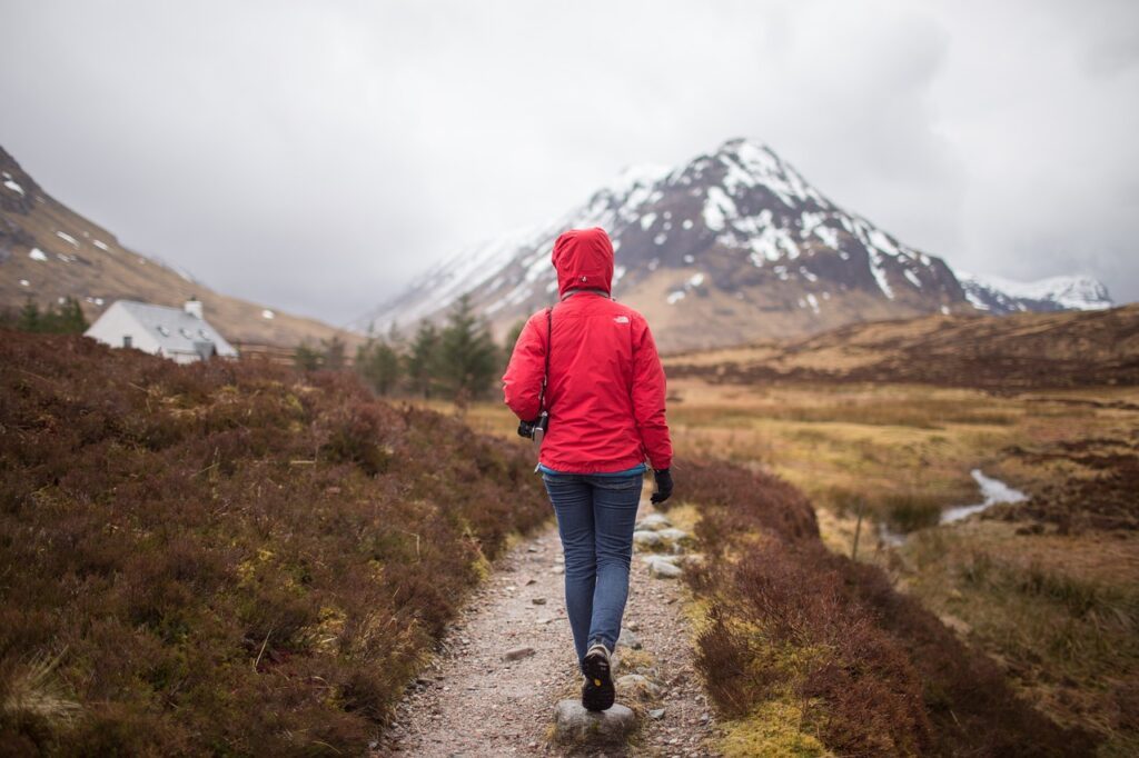 woman hiking on trail